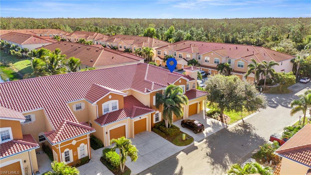 10057 Via Colomba Circle, Unit 206 Fort Myers, FL 33966 - Photo 6 of 46 an aerial view of residential house with outdoor space and ocean view