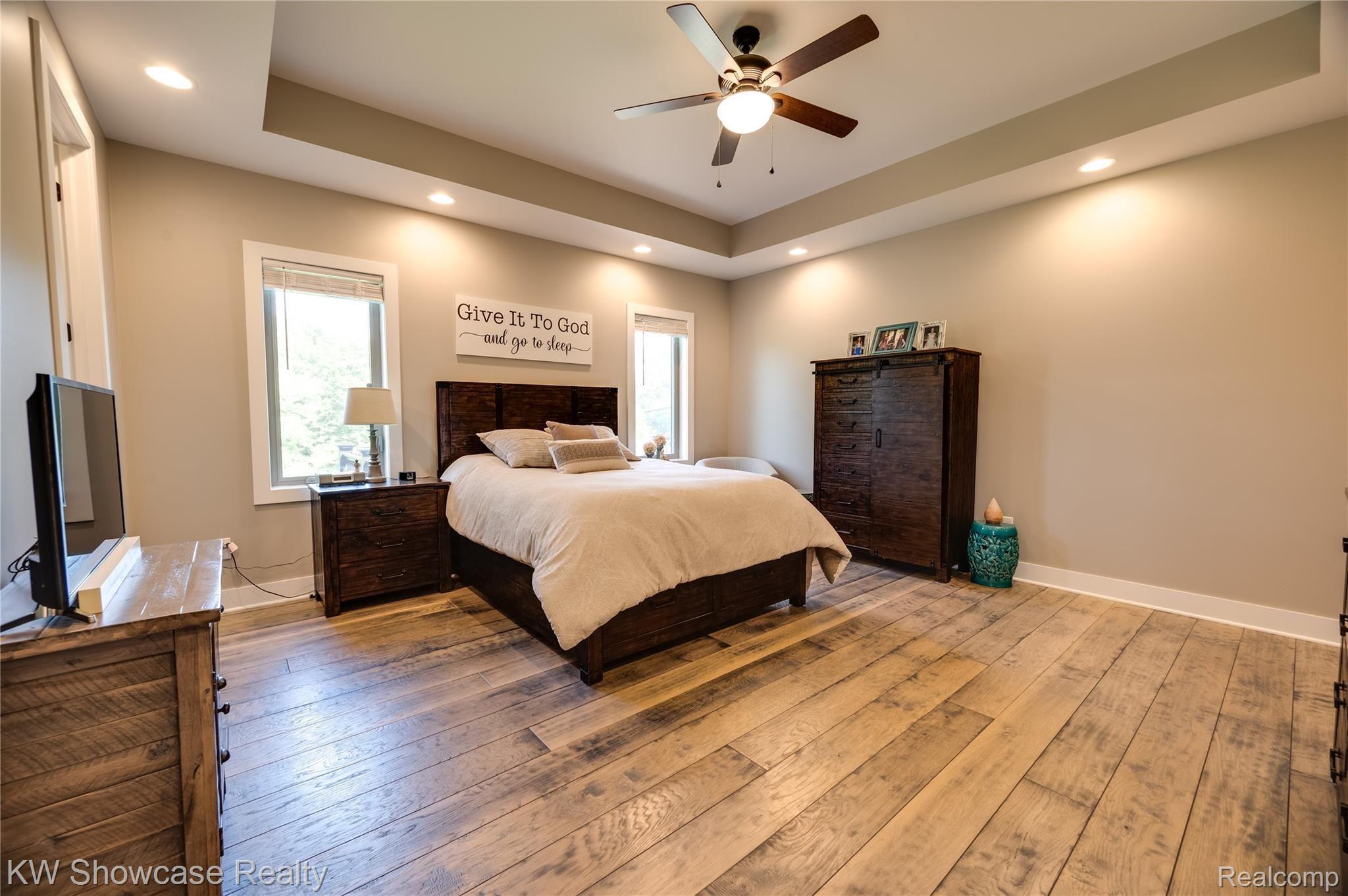 1018 Grandview Drive Rochester, MI 48306 - Photo 29 of 73 Ceiling Fan. Hardwood flooring.