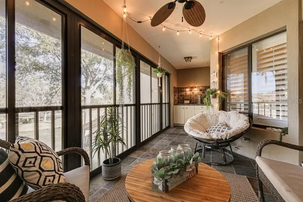 a view of a dining room with furniture window and outside view