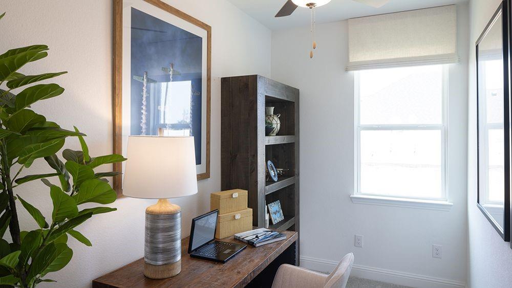 1425 Arciones Road Fort Worth, TX 76052 - Photo 12 of 17 a living room with furniture and a potted plant