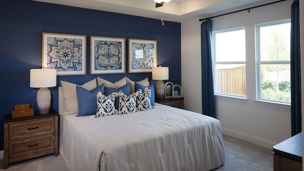 1425 Arciones Road Fort Worth, TX 76052 - Photo 7 of 17 a bedroom with a large bed and a window