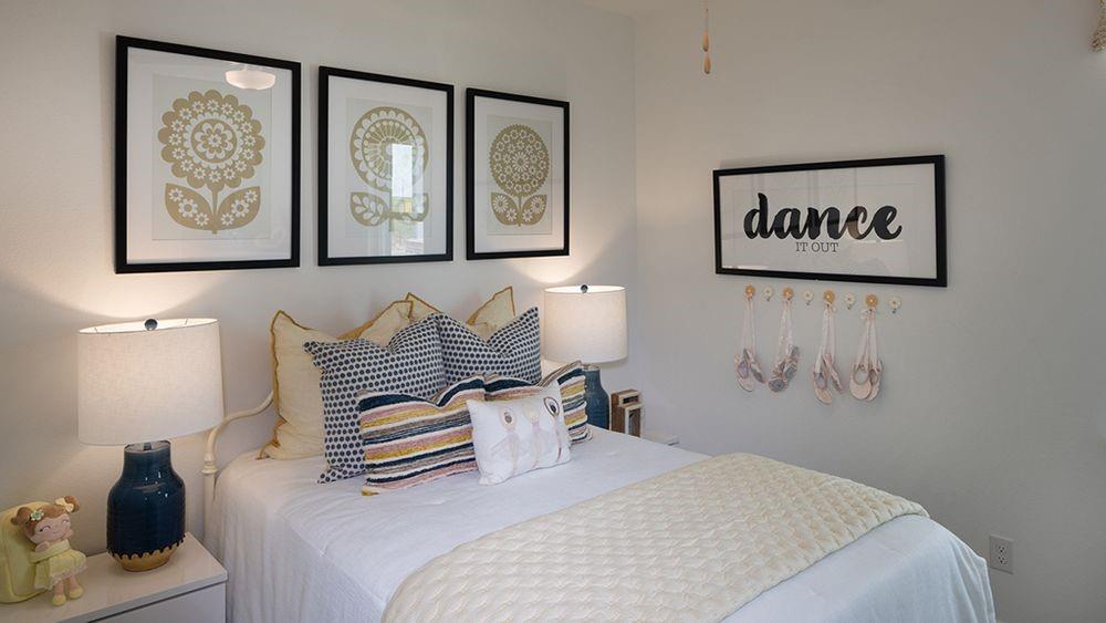 1425 Arciones Road Fort Worth, TX 76052 - Photo 10 of 17 a bedroom with a bed and a painting on the wall