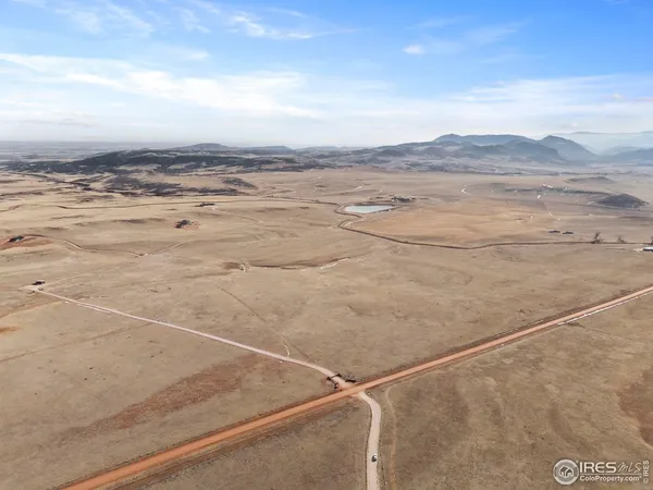 a view of an ocean and a mountain