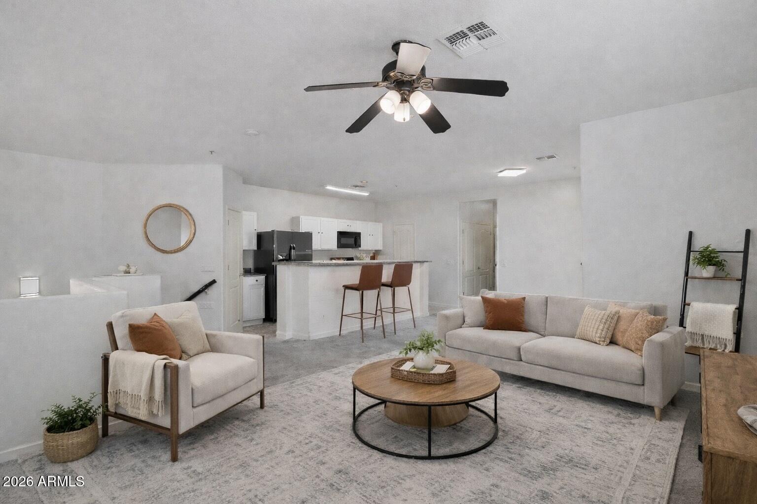 8189 West Groom Creek Road Phoenix, AZ 85043 - Photo 10 of 37 a living room with furniture and a wooden floor