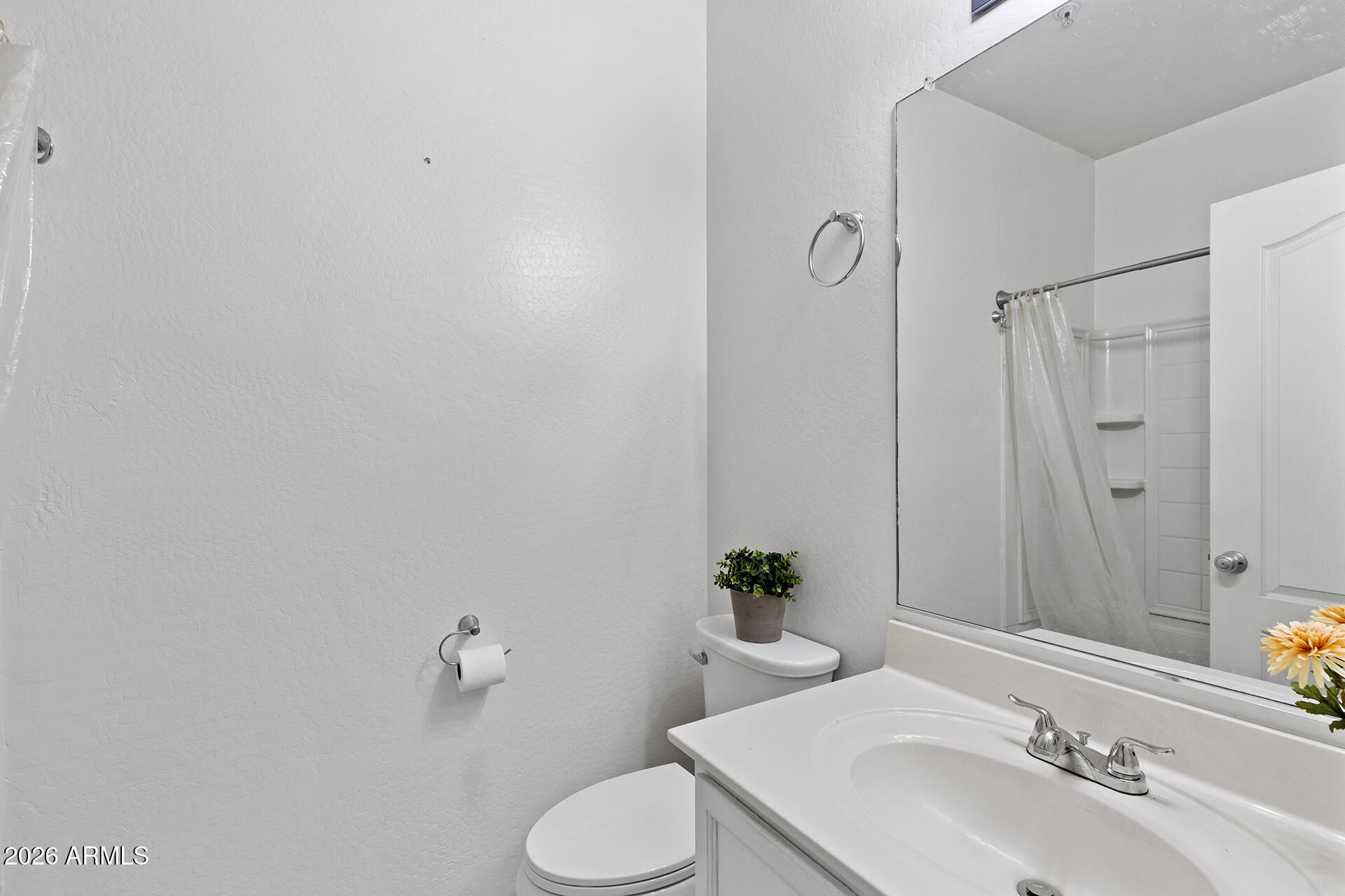 8189 West Groom Creek Road Phoenix, AZ 85043 - Photo 24 of 37 a bathroom with a sink toilet and shower
