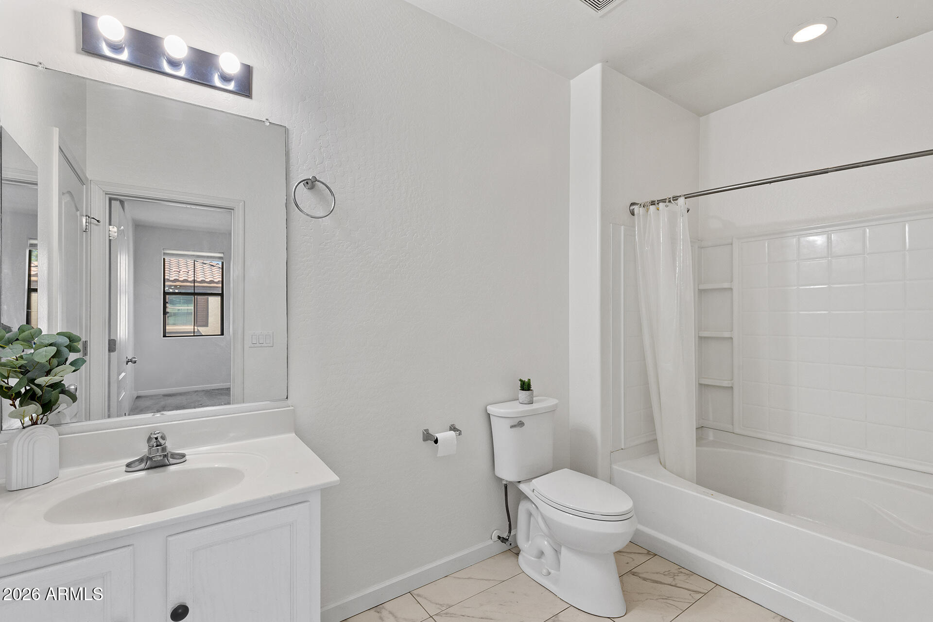 8189 West Groom Creek Road Phoenix, AZ 85043 - Photo 29 of 37 a bathroom with a sink toilet and shower