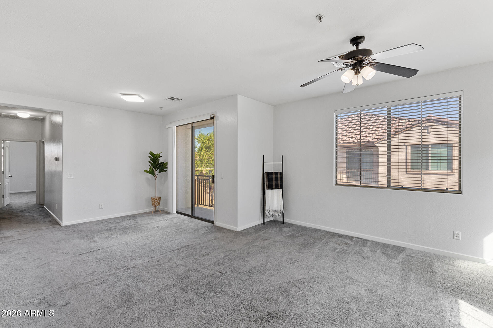 8189 West Groom Creek Road Phoenix, AZ 85043 - Photo 7 of 37 a view of an empty room with a window