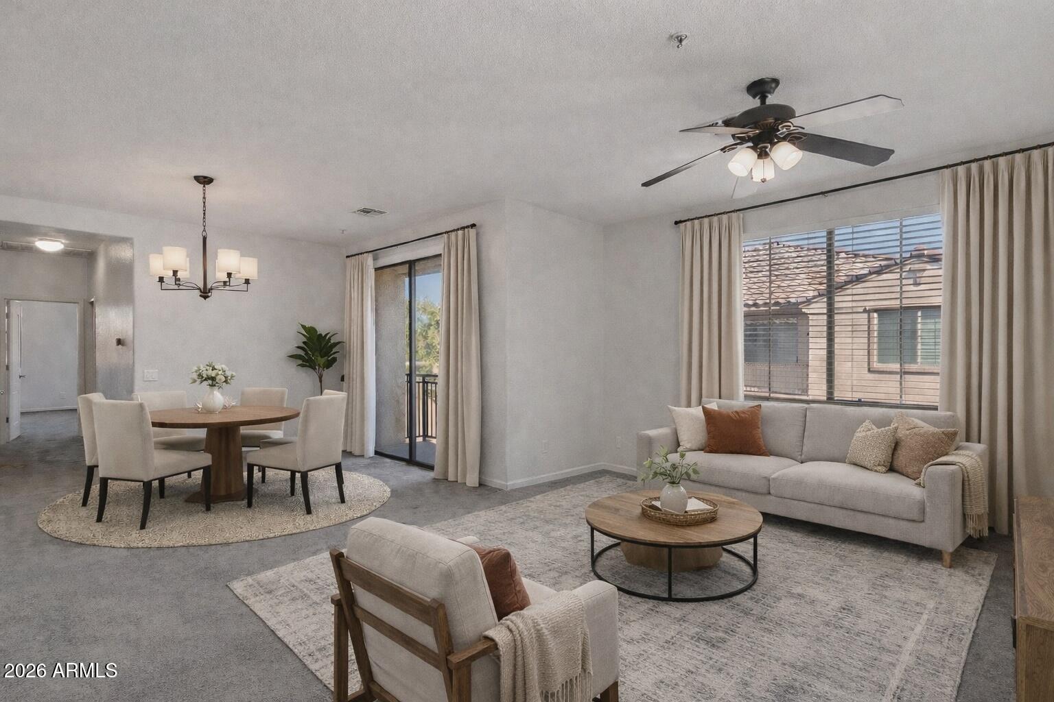 8189 West Groom Creek Road Phoenix, AZ 85043 - Photo 8 of 37 a living room with furniture and a large window