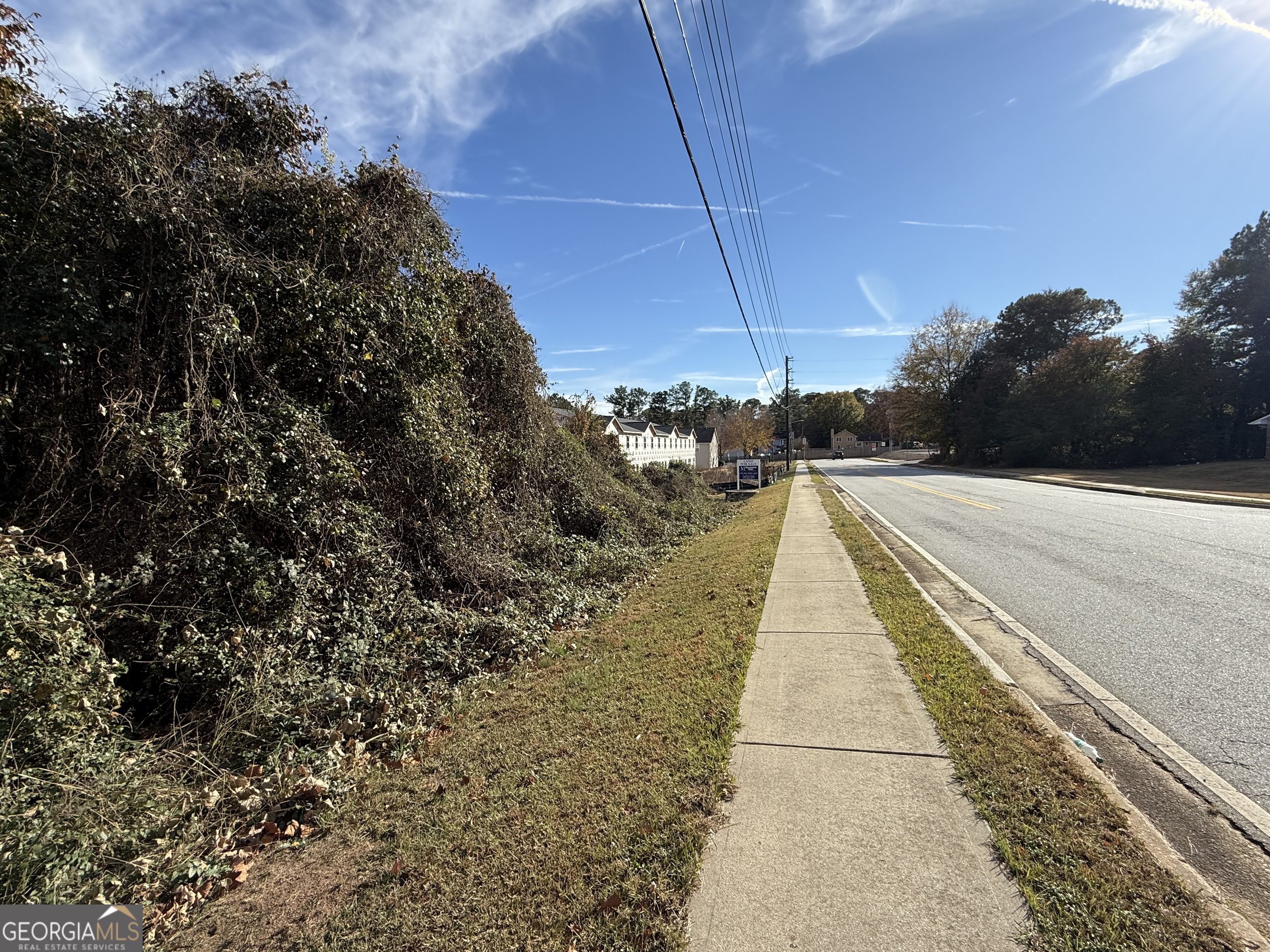 8652 Webb Road Riverdale, GA 30274 - Photo 2 of 6 a view of house with a yard