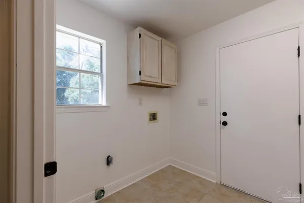 a view of a room with stairs and furniture