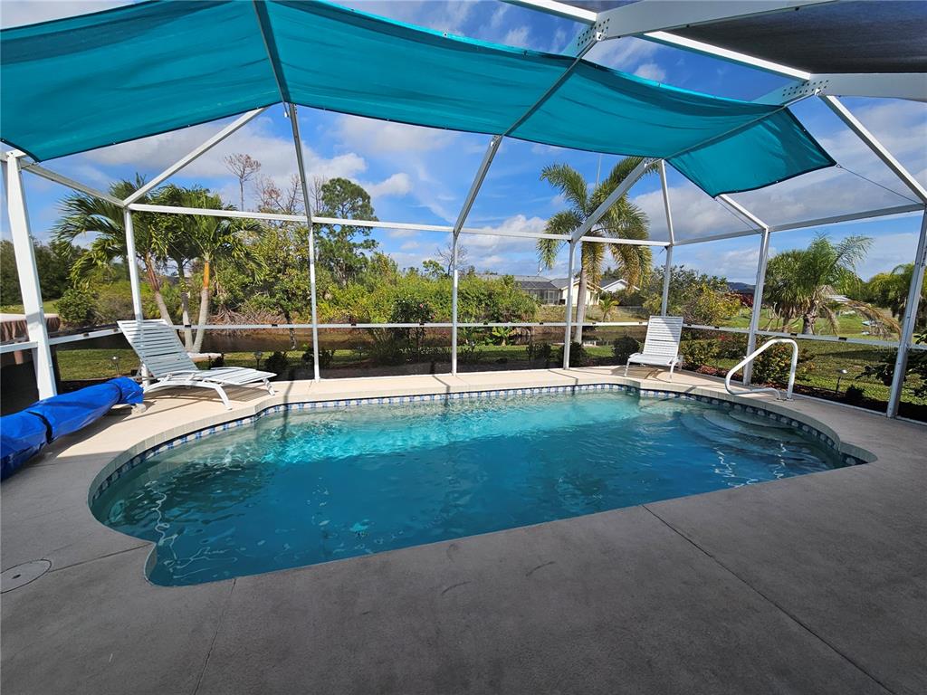 114 Albatross Road Rotonda West, FL 33947 - Photo 29 of 36 a view of a park with sitting area