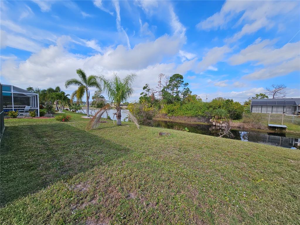 114 Albatross Road Rotonda West, FL 33947 - Photo 35 of 36 a view of a backyard