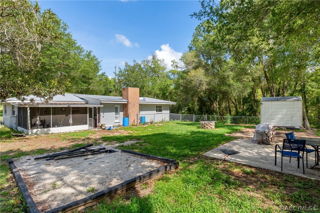 1140 South Highlands Avenue Inverness, FL 34452 - Photo 37 of 54 a view of a house with a yard and sitting area