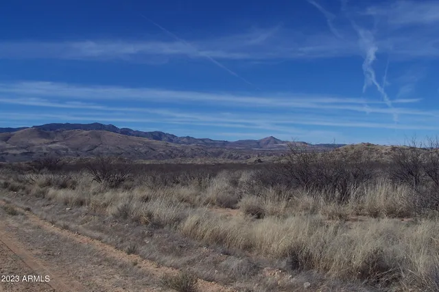 a view of mountain with lake view