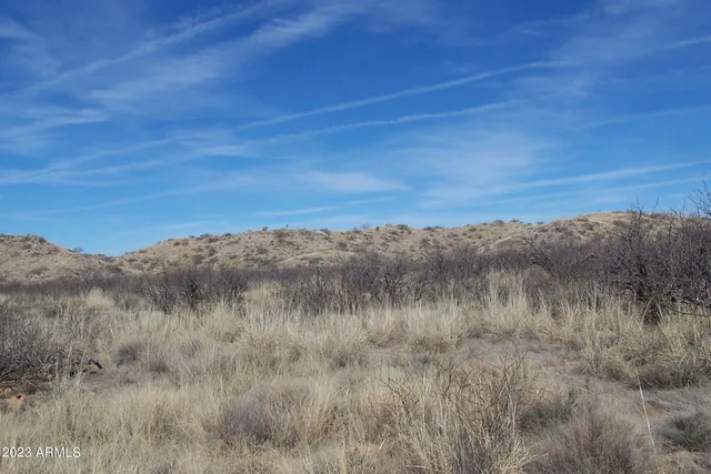a view of a lake with a mountain in the background