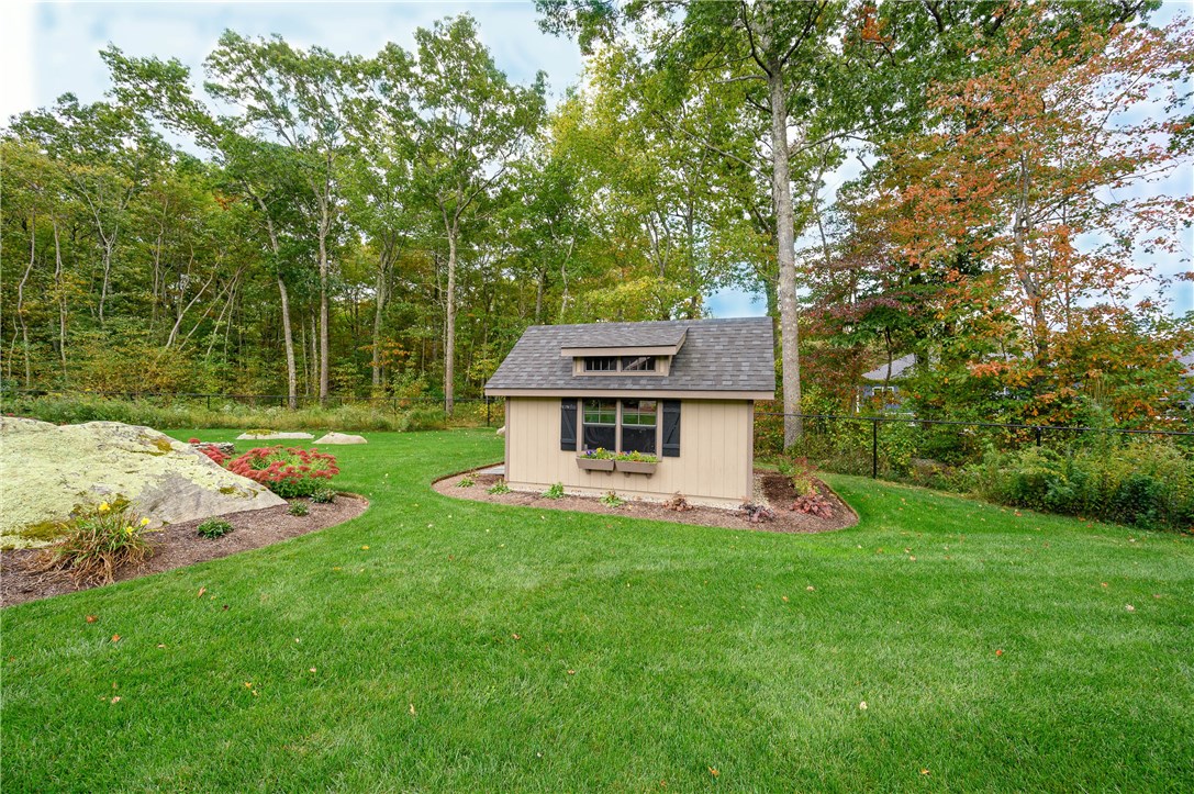 52 Kayla Ricci Way Exeter, RI 02874 - Photo 8 of 40 Custom shed with window boxes.