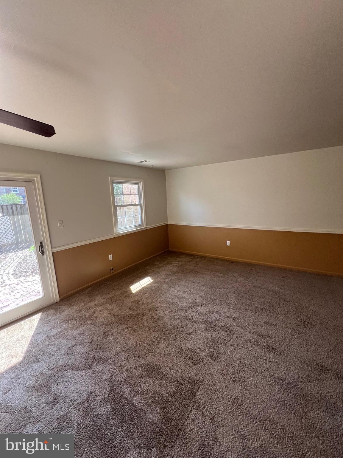 5805 Morningbird Lane Columbia, MD 21045 - Photo 7 of 26 a view of an empty room with window