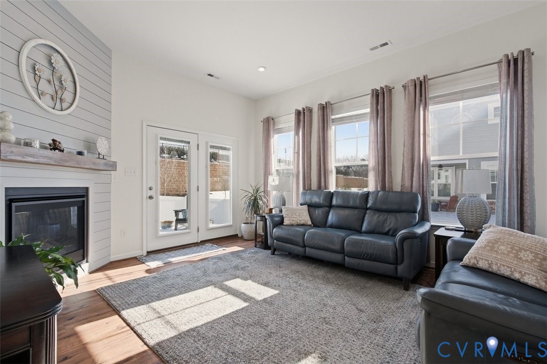 12813 Deep Wl Road Midlothian, VA 23112 - Photo 14 of 35 a living room with furniture and a fireplace