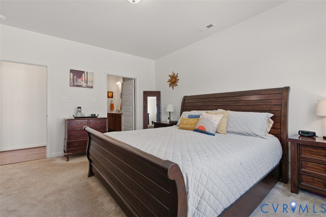 12813 Deep Wl Road Midlothian, VA 23112 - Photo 19 of 35 a bed room with a bed and a dresser