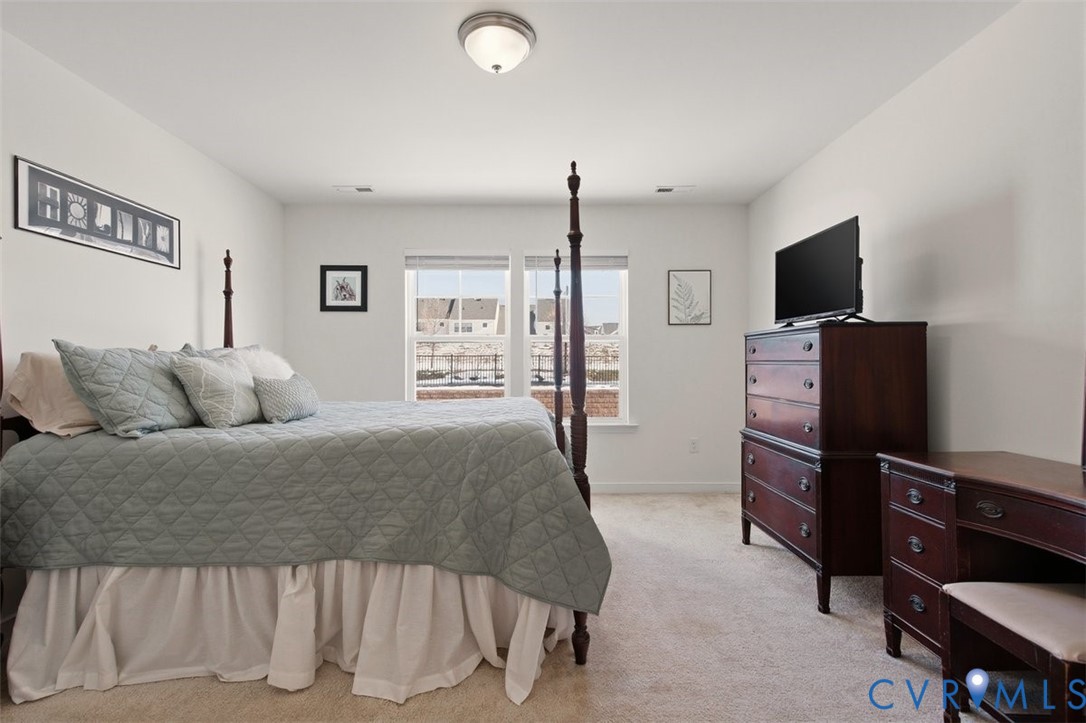 12813 Deep Wl Road Midlothian, VA 23112 - Photo 29 of 35 a living room with furniture and a flat screen tv