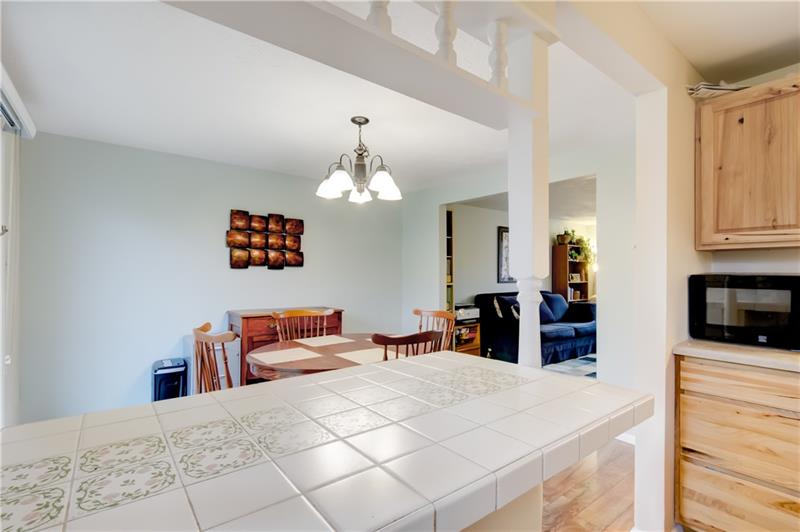 222 Quail Run Road Venetia, PA 15367 - Photo 14 of 22 Breakfast bar between kitchen and dining room. Nice open floor plan.