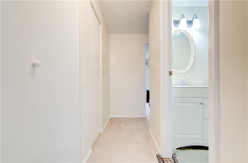 222 Quail Run Road Venetia, PA 15367 - Photo 21 of 22 Second floor hallway with a entire wall of closets! This home has plenty of storage options.