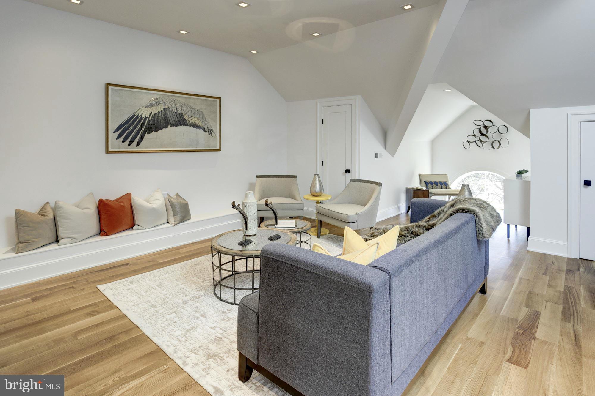 3713 Reservoir Road Northwest Washington, DC 20007 - Photo 21 of 30 a living room with furniture and a wooden floor