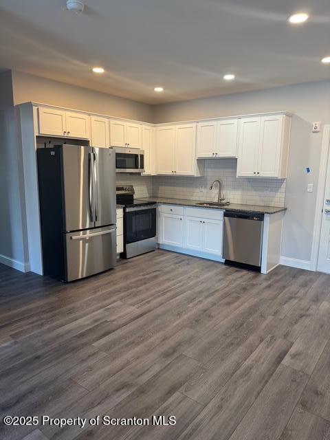 416 Circle Drive Taylor, PA 18517 - Photo 6 of 33 a kitchen with stainless steel appliances granite countertop a refrigerator sink and cabinets