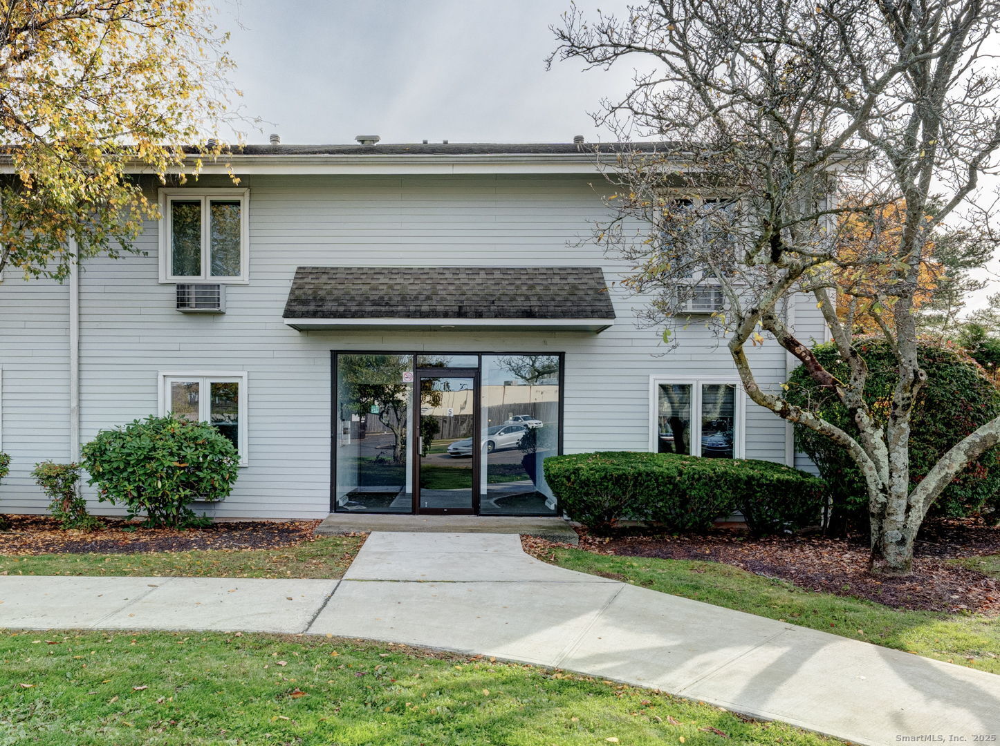 a house view with a garden space