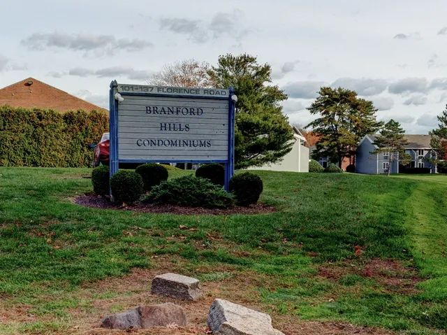 a view of a pathway in front of house
