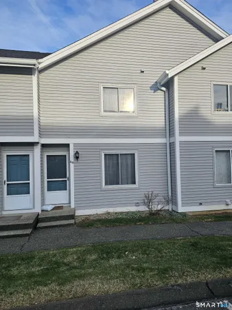 a front view of house with yard