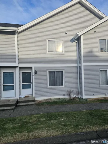 a front view of house with yard