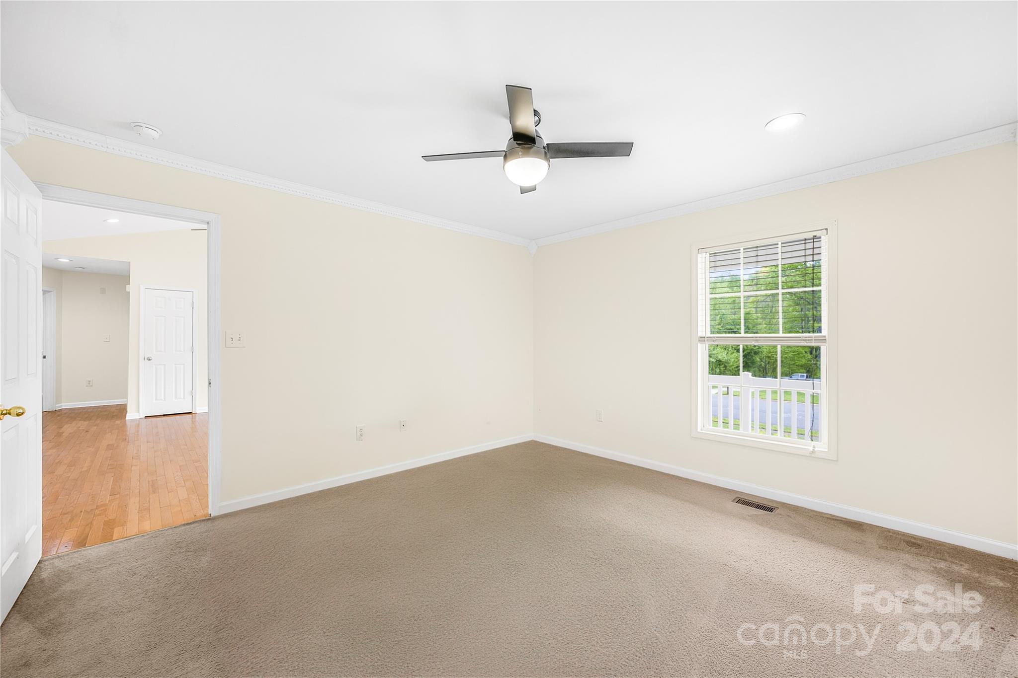 220 Shenandoah Loop Troutman, NC 28166 - Photo 11 of 26 an empty room with windows