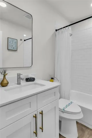 a bathroom with a sink and a toilet