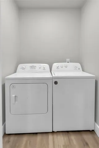 a utility room with dryer and washer