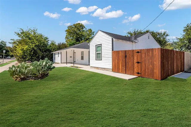 a house view with a garden space