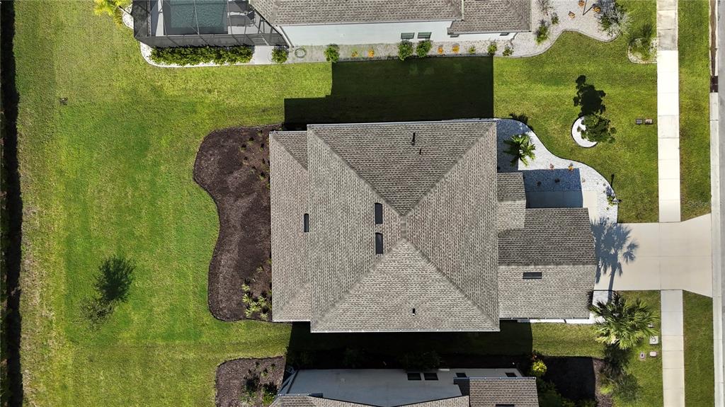 9312 Tequila Sunrise Drive Sarasota, FL 34241 - Photo 3 of 78 an aerial view of a house with a garden