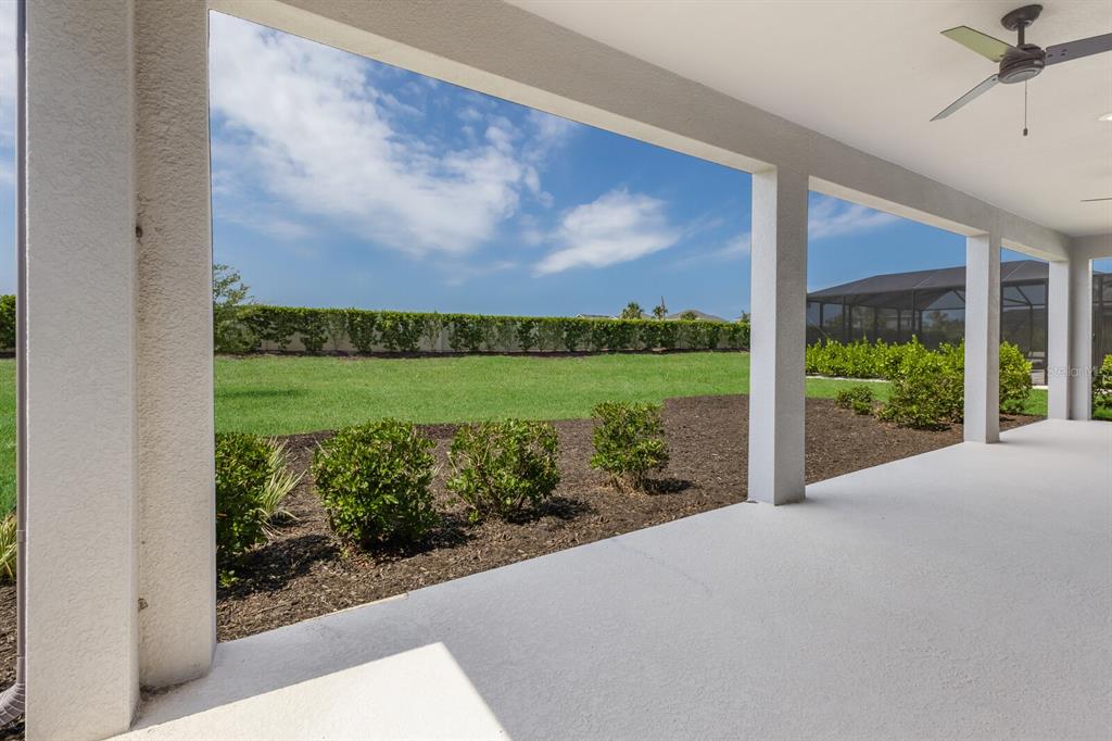 9312 Tequila Sunrise Drive Sarasota, FL 34241 - Photo 31 of 78 a view of a garden and basketball court