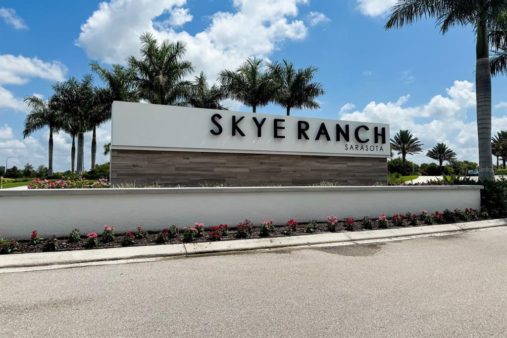 9312 Tequila Sunrise Drive Sarasota, FL 34241 - Photo 78 of 78 front view of a house with a street