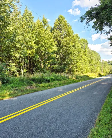 a view of a yard with an empty space