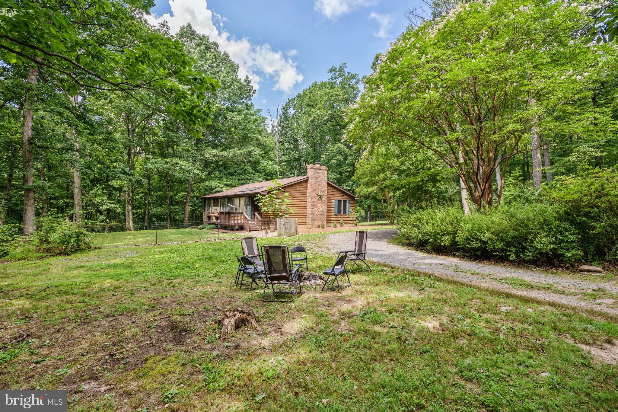 43536 Spinks Ferry Road Leesburg, VA 20176 - Photo 8 of 33 Firepit on the side of the home