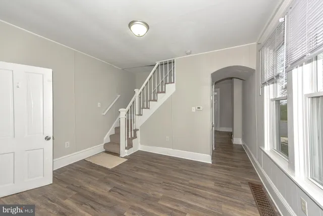 a view of entryway with wooden floor