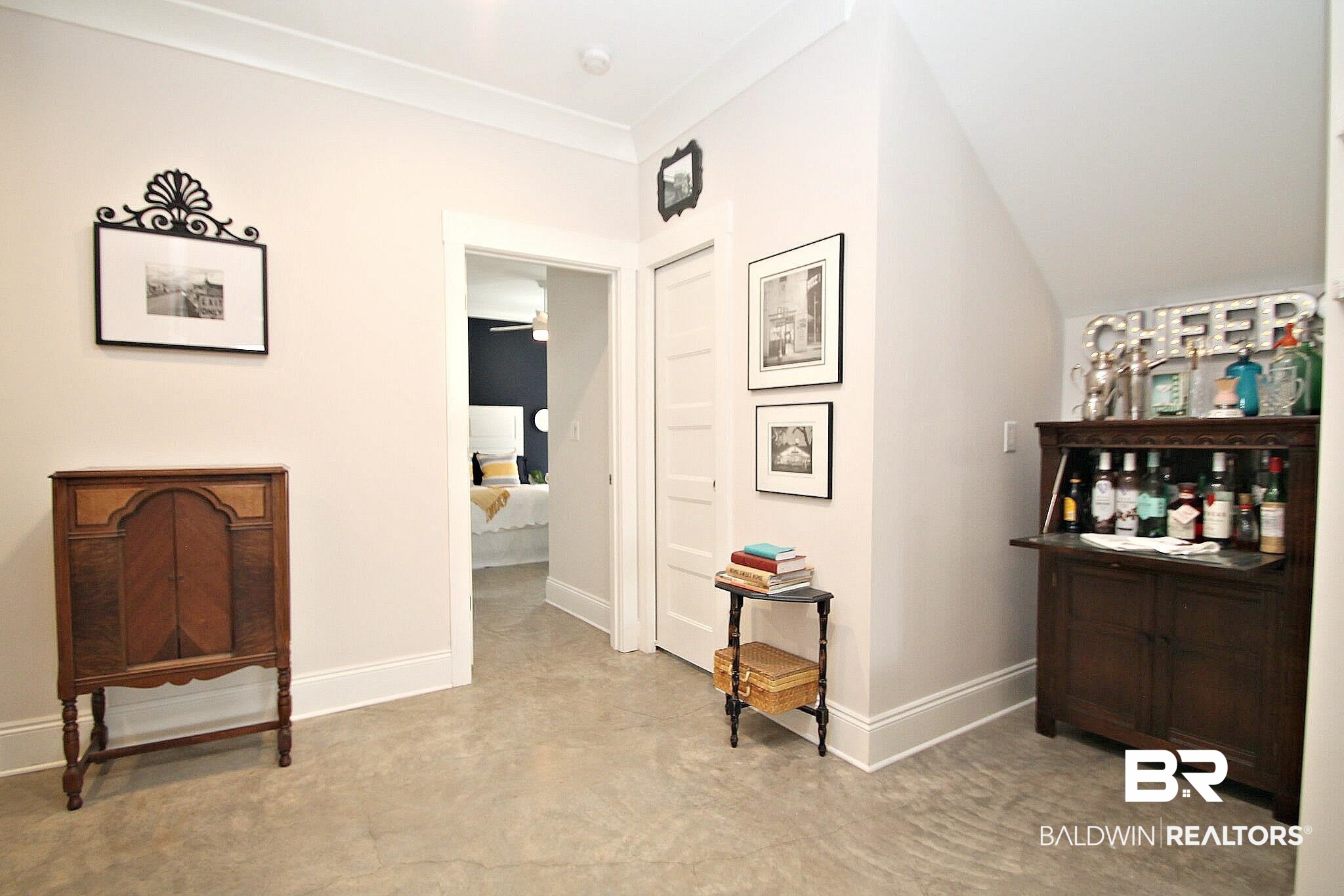3415 Rue Royal Mobile, AL 36693 - Photo 11 of 31 Bar with a ceiling fan and baseboards