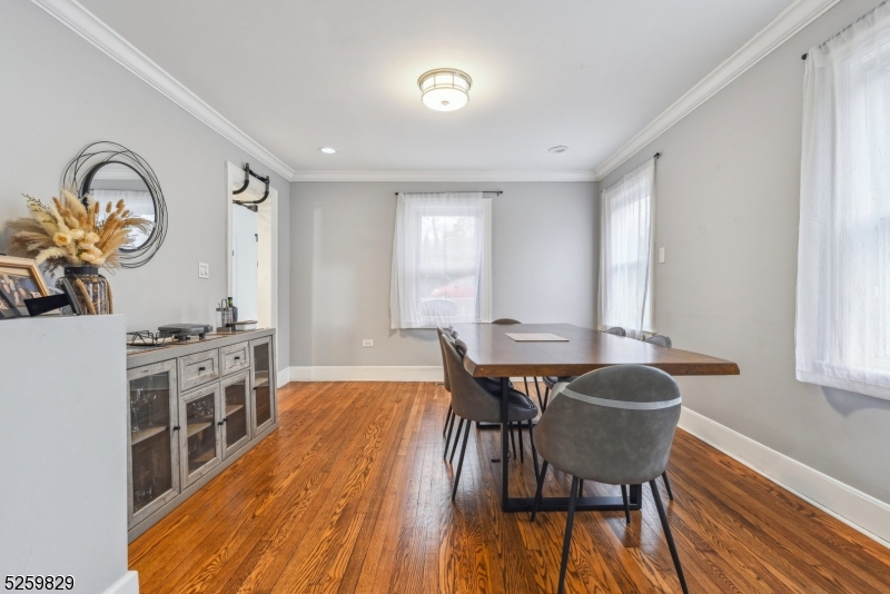 759 Ridgewood Road Millburn, NJ 07041 - Photo 7 of 36 a view of a a dining room with furniture window and wooden floor