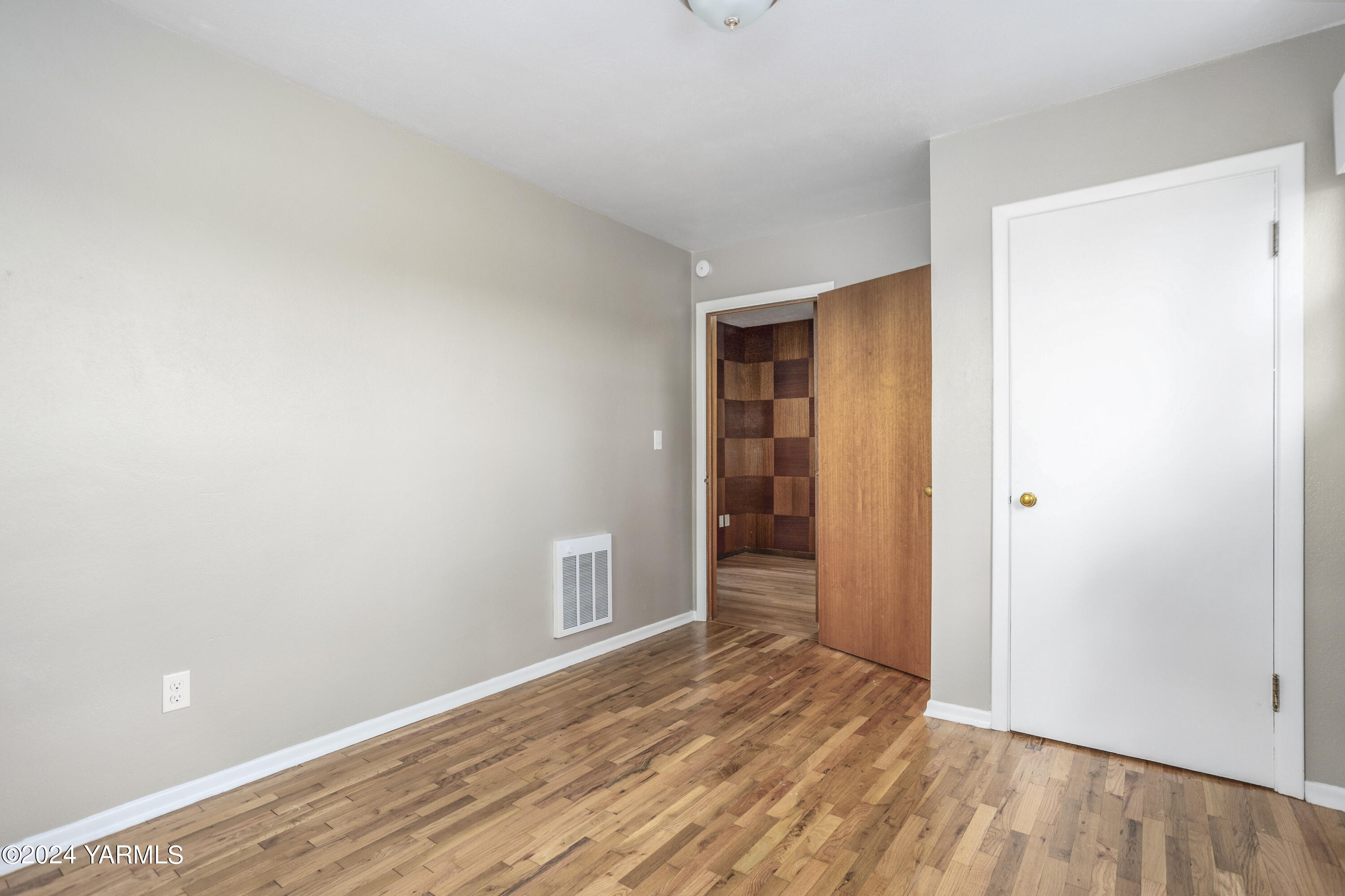 149402 McCreadie Road Prosser, WA 99350 - Photo 16 of 58 a view of empty room with wooden floor