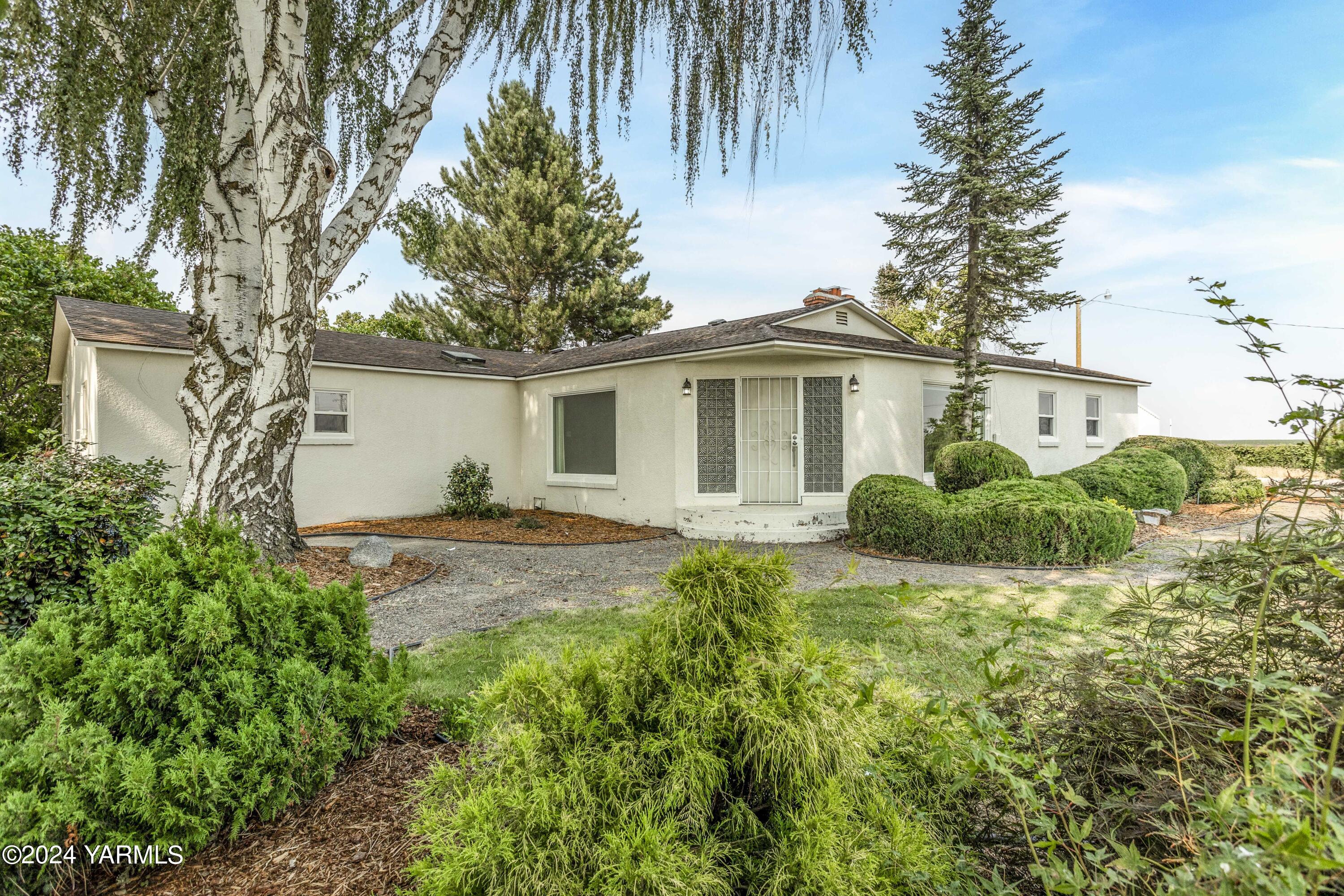 149402 McCreadie Road Prosser, WA 99350 - Photo 49 of 58 a view of a house with a yard and tree s