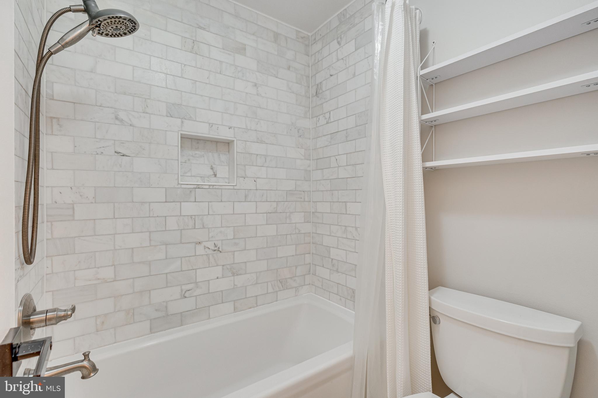 11608 Windbluff Court, Unit 7/007B2 Reston, VA 20191 - Photo 26 of 47 Upgraded bath with heated tile floors