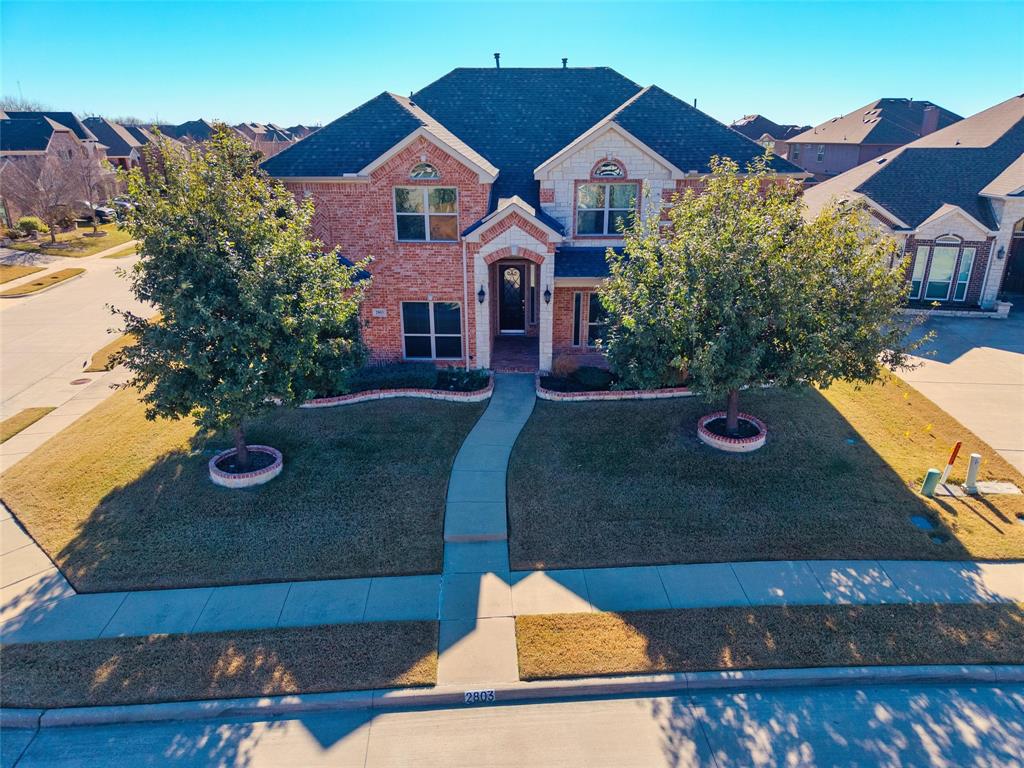 2803 Pino Grand Prairie, TX 75054 - Photo 2 of 36 an aerial view of a house