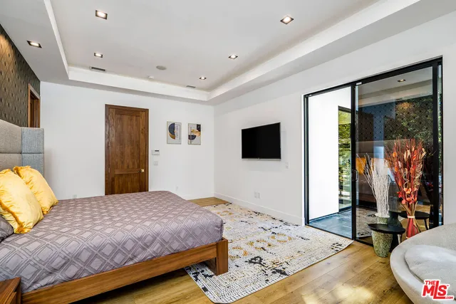 a bathroom with a double vanity sink and a bathtub