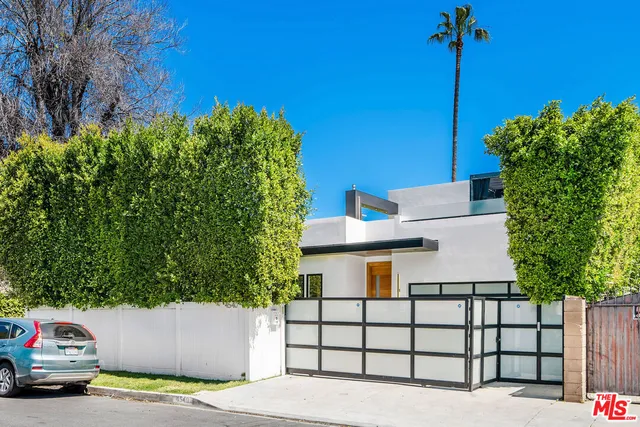 a view of a house with a swimming pool